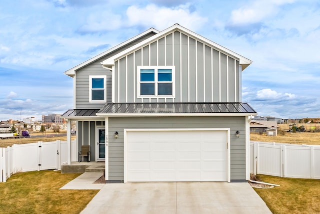 2009 Meriwether Ct, Great Falls, MT 59405 - view of front of house with driveway, a gate, a garage, and a front yard