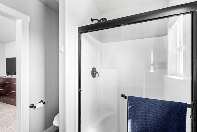 2009 Meriwether Ct, Great Falls, MT 59405 - bathroom featuring a stall shower and toilet