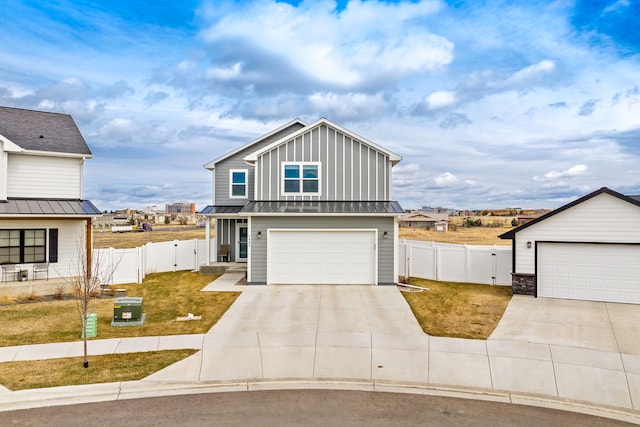 2009 Meriwether Ct, Great Falls, MT 59405 - view of front of property featuring metal roof, fence, a gate, a standing seam roof, and driveway