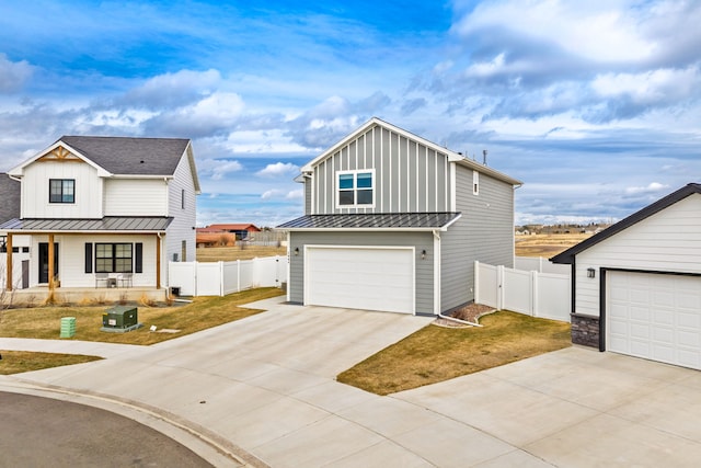 2009 Meriwether Ct, Great Falls, MT 59405 - modern farmhouse featuring a standing seam roof, fence, metal roof, board and batten siding, and a porch