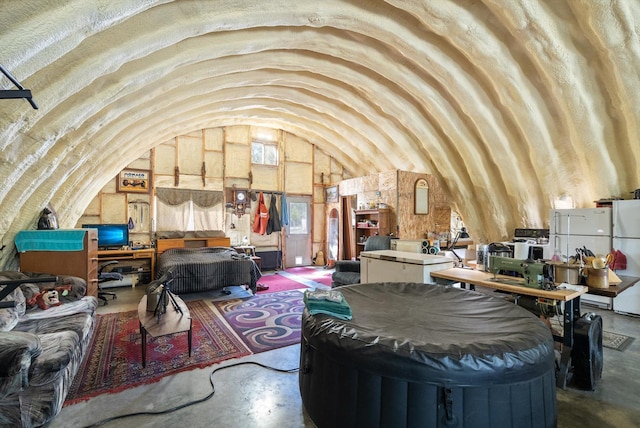288 Mountain Meadow Rd, Kalispell, MT 59901 - miscellaneous room with concrete floors and vaulted ceiling