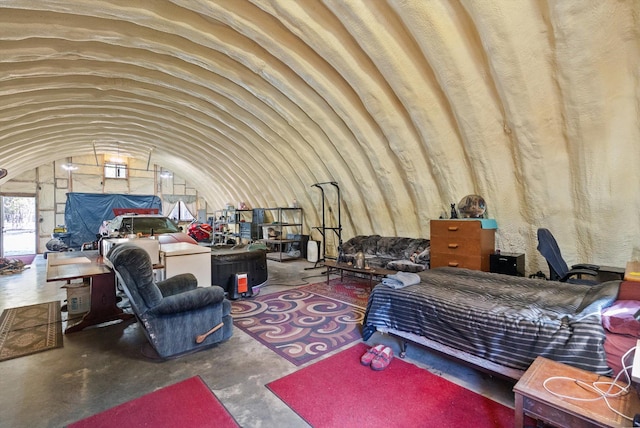 288 Mountain Meadow Rd, Kalispell, MT 59901 - bedroom with concrete floors and lofted ceiling