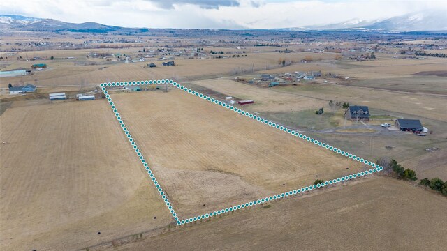552 Pat Ln, Stevensville, MT 59870 - bird's eye view featuring a mountain view and a rural view