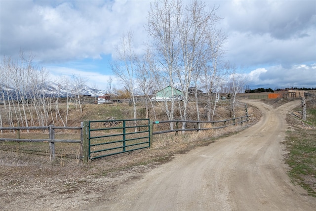 552 Pat Ln, Stevensville, MT 59870 - view of road featuring a gate and a rural view