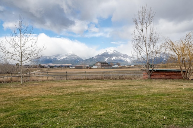 552 Pat Ln, Stevensville, MT 59870 - view of yard featuring a mountain view, fence, and a rural view