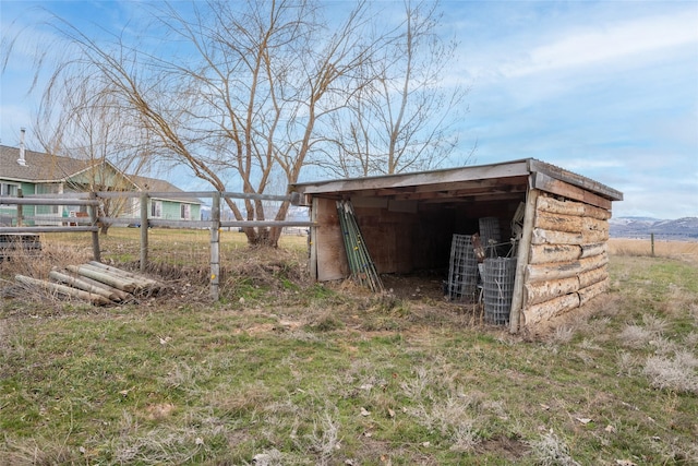 552 Pat Ln, Stevensville, MT 59870 - view of outdoor structure with fence and an outdoor structure