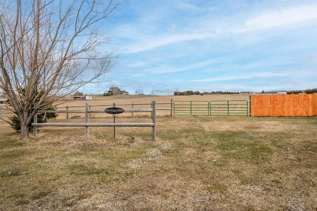552 Pat Ln, Stevensville, MT 59870 - view of yard with a gate, fence, and a rural view