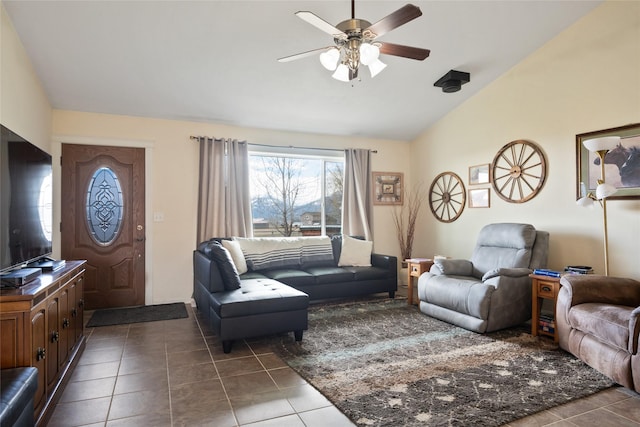 552 Pat Ln, Stevensville, MT 59870 - living area with tile patterned flooring, vaulted ceiling, and ceiling fan