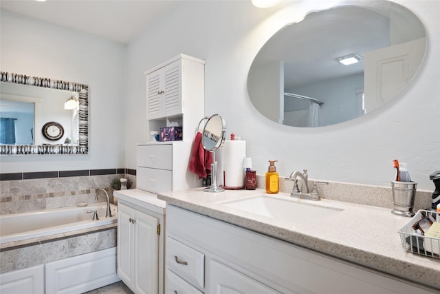 552 Pat Ln, Stevensville, MT 59870 - bathroom featuring a shower, vanity, and a garden tub