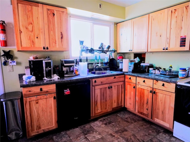 kitchen featuring stone finish flooring, dark countertops, black dishwasher, a sink, and range with electric stovetop