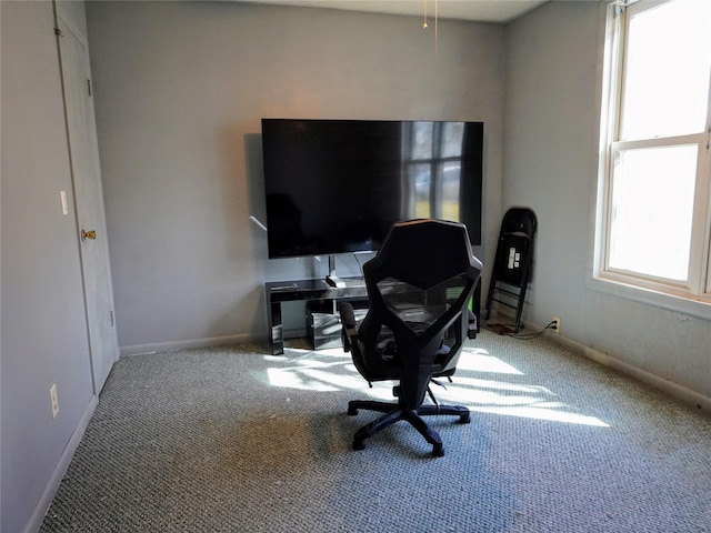 carpeted office with baseboards