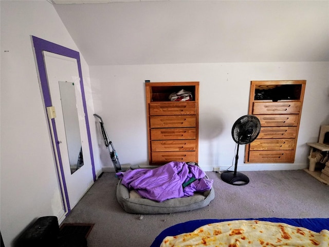 carpeted bedroom with vaulted ceiling