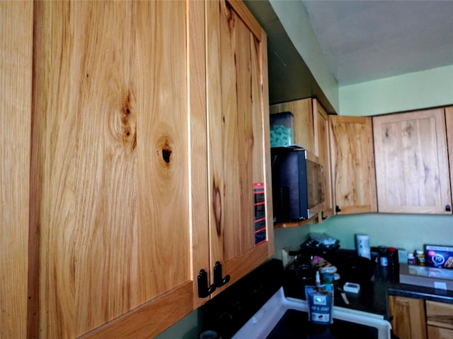 kitchen featuring stainless steel microwave