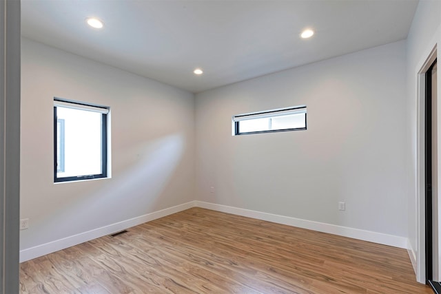 2212 S 12th St W, Missoula, MT 59801 - unfurnished room featuring baseboards, a healthy amount of sunlight, and light wood finished floors
