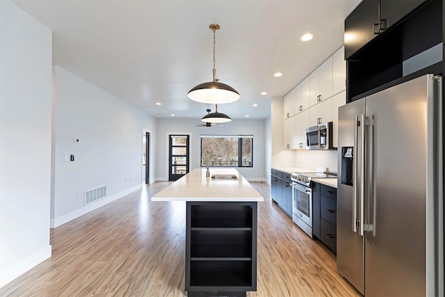 2212 S 12th St W, Missoula, MT 59801 - kitchen with stainless steel appliances, a sink, beverage cooler, visible vents, and modern cabinets