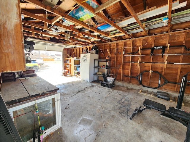 garage with freestanding refrigerator