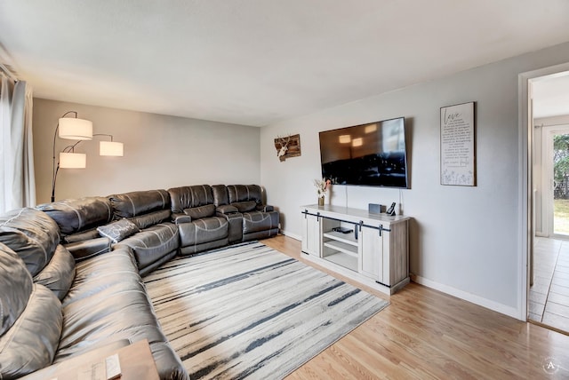 1565 Beaverhead Rd, Helena, MT 59602 - living room featuring light wood-style floors and baseboards