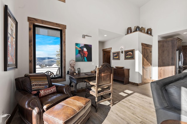 85 Meadows Dr, Whitefish, MT 59937 - living area featuring light wood-style floors, a high ceiling, and recessed lighting