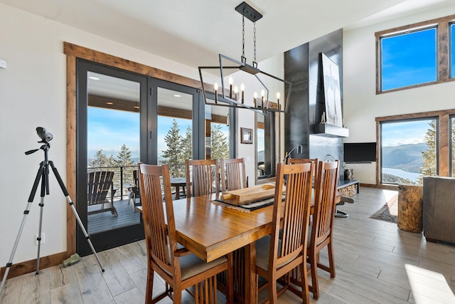 85 Meadows Dr, Whitefish, MT 59937 - dining room featuring plenty of natural light, a chandelier, and light wood-type flooring
