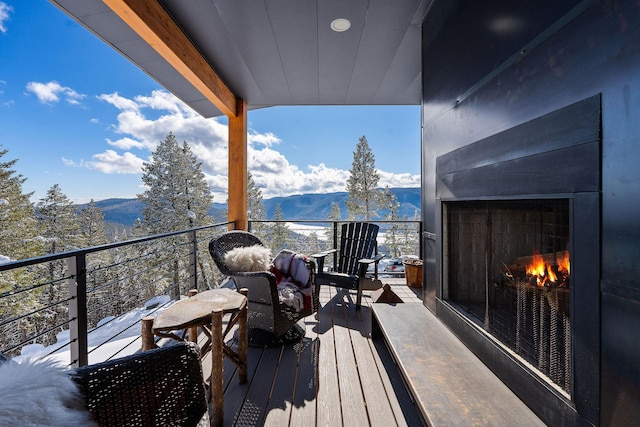 85 Meadows Dr, Whitefish, MT 59937 - balcony with a mountain view and a large fireplace