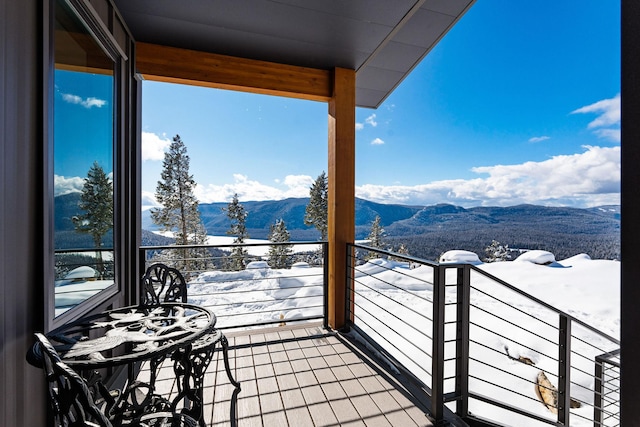 85 Meadows Dr, Whitefish, MT 59937 - snow covered back of property featuring a mountain view