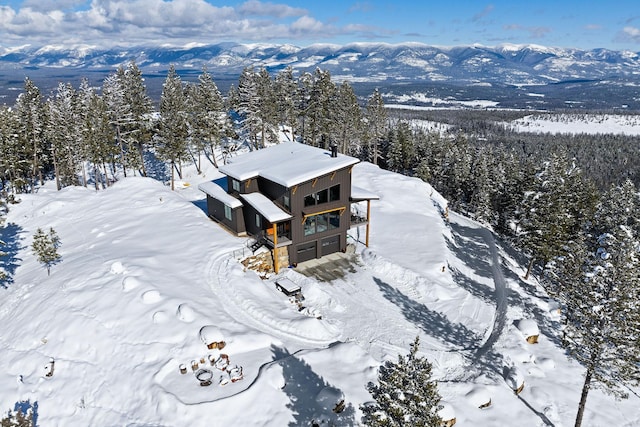 85 Meadows Dr, Whitefish, MT 59937 - snowy aerial view featuring a mountain view