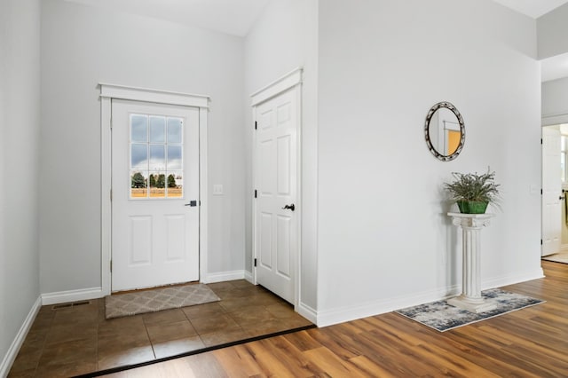 369 Gold Ct, Florence, MT 59833 - foyer featuring baseboards and wood finished floors
