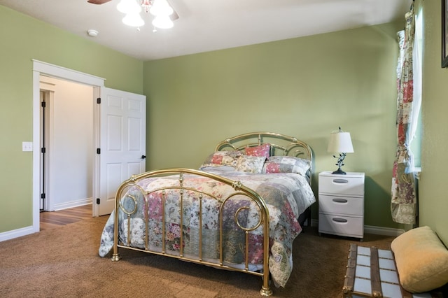 369 Gold Ct, Florence, MT 59833 - bedroom with carpet floors, baseboards, and ceiling fan