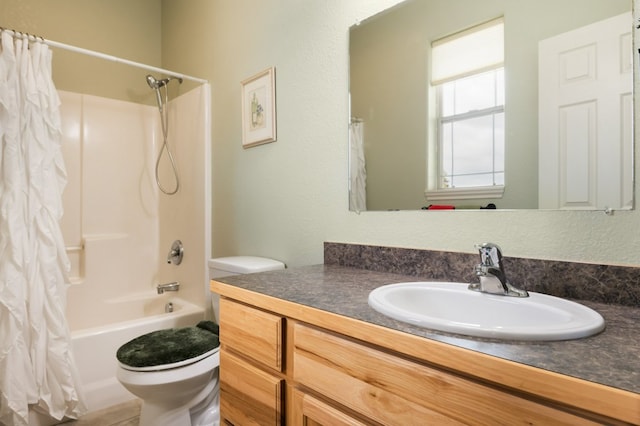 369 Gold Ct, Florence, MT 59833 - bathroom featuring toilet, vanity, and shower / bath combination with curtain