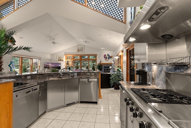 229AND231 Harbor Dr, Bigfork, MT 59911 - kitchen featuring appliances with stainless steel finishes, island range hood, a ceiling fan, high vaulted ceiling, and open floor plan