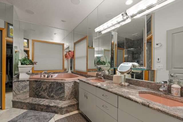 229AND231 Harbor Dr, Bigfork, MT 59911 - full bath featuring a garden tub, double vanity, and a shower with shower door