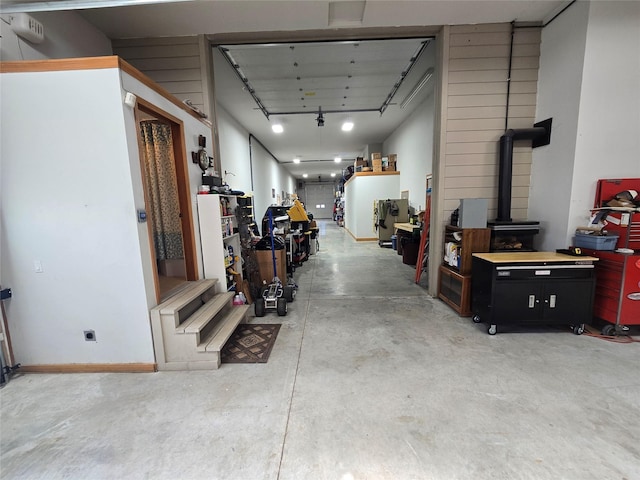 229AND231 Harbor Dr, Bigfork, MT 59911 - garage with a wood stove