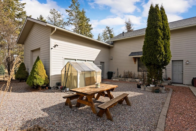 229AND231 Harbor Dr, Bigfork, MT 59911 - back of property with an outdoor structure