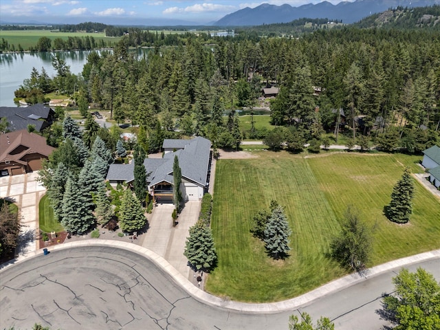 229AND231 Harbor Dr, Bigfork, MT 59911 - aerial view of property and surrounding area featuring a water and mountain view and a forest