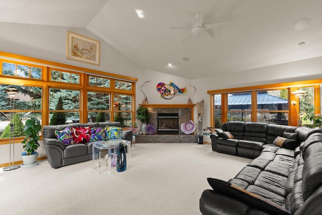 229AND231 Harbor Dr, Bigfork, MT 59911 - living room featuring carpet, lofted ceiling, ceiling fan, and a fireplace with raised hearth