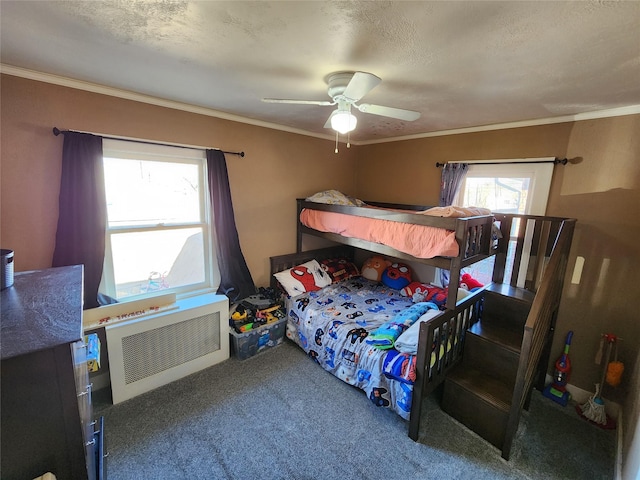 3301 1st Ave N, Great Falls, MT 59401 - carpeted bedroom with a ceiling fan and crown molding