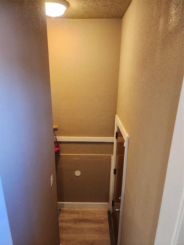 3301 1st Ave N, Great Falls, MT 59401 - stairway with wood finished floors and a textured wall