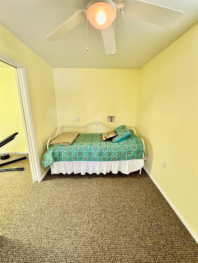 19066 King Rd, Florence, MT 59833 - carpeted bedroom featuring baseboards and ceiling fan
