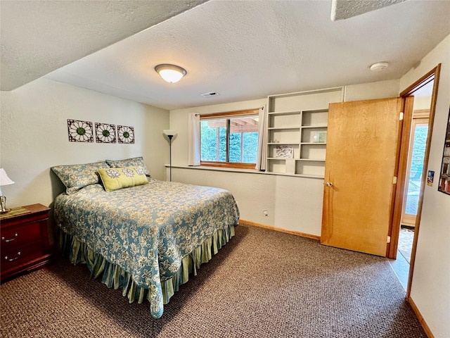 19066 King Rd, Florence, MT 59833 - bedroom with carpet flooring and a textured ceiling