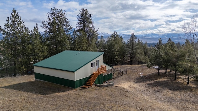 19066 King Rd, Florence, MT 59833 - view of property exterior featuring a mountain view and metal roof