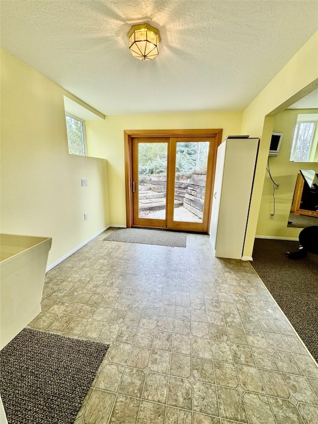 19066 King Rd, Florence, MT 59833 - interior space featuring a textured ceiling