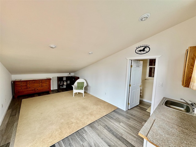 19066 King Rd, Florence, MT 59833 - interior space featuring baseboards, lofted ceiling, and wood finished floors