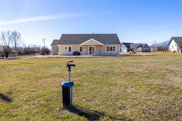376 Cowboy Ct, Florence, MT 59833 - ranch-style home with a patio and a front yard