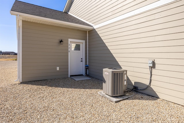 376 Cowboy Ct, Florence, MT 59833 - view of exterior entry with central AC