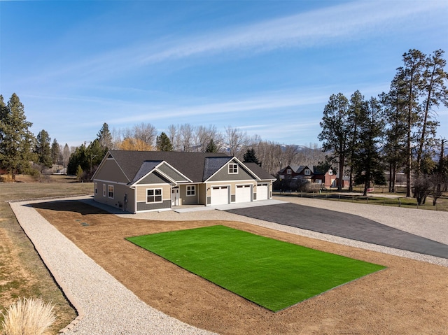 376 Cowboy Ct, Florence, MT 59833 - craftsman-style home with driveway and an attached garage