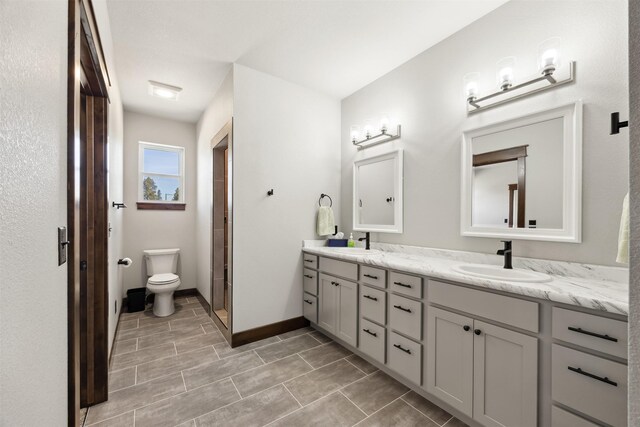 376 Cowboy Ct, Florence, MT 59833 - full bathroom featuring double vanity, a shower, and tile patterned flooring