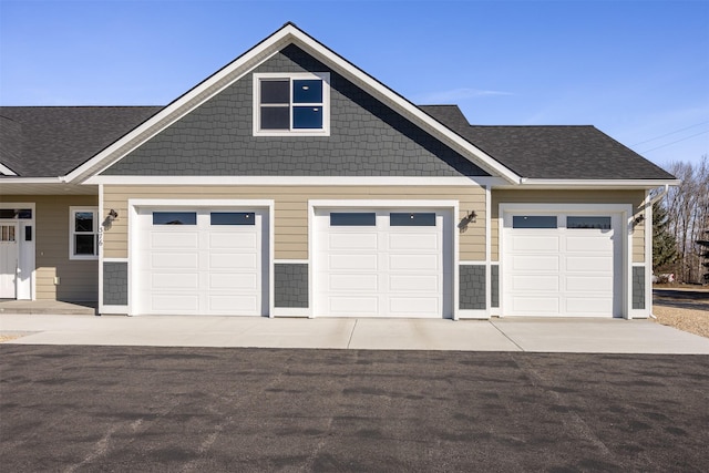 376 Cowboy Ct, Florence, MT 59833 - garage featuring driveway
