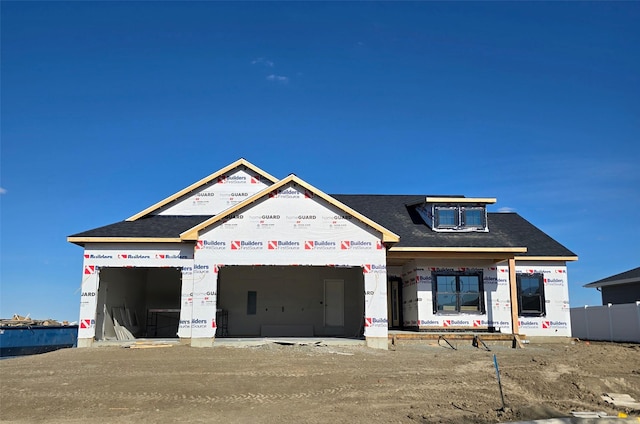 4017 12th St NE, Great Falls, MT 59404 - unfinished property featuring a shingled roof and an attached garage