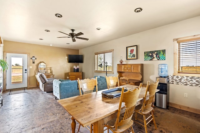 dining space with a ceiling fan, baseboards, and recessed lighting