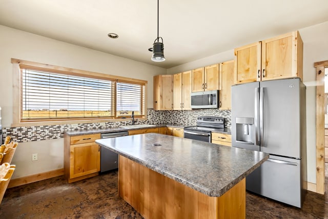 kitchen with a sink, tasteful backsplash, appliances with stainless steel finishes, a center island, and dark countertops